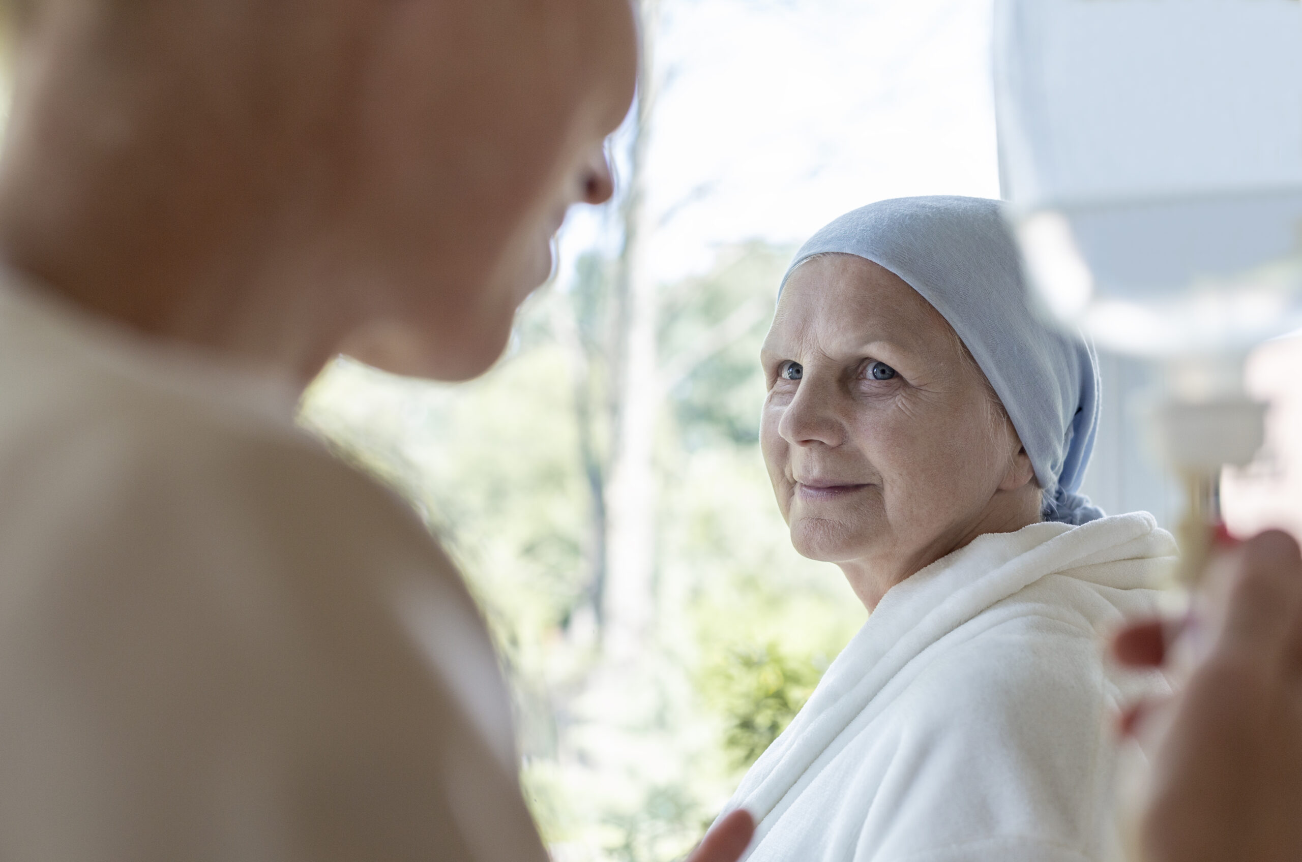 Doctor and senior patient with terminal illness in hospital
